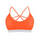 Orange swimwear top with criss-cross straps on a white background