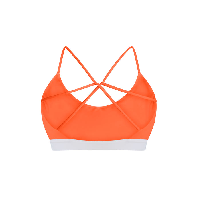 Orange swimwear top with criss-cross straps on a white background