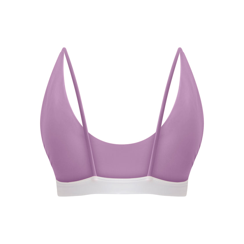 Purple bralette with thin straps on a white background